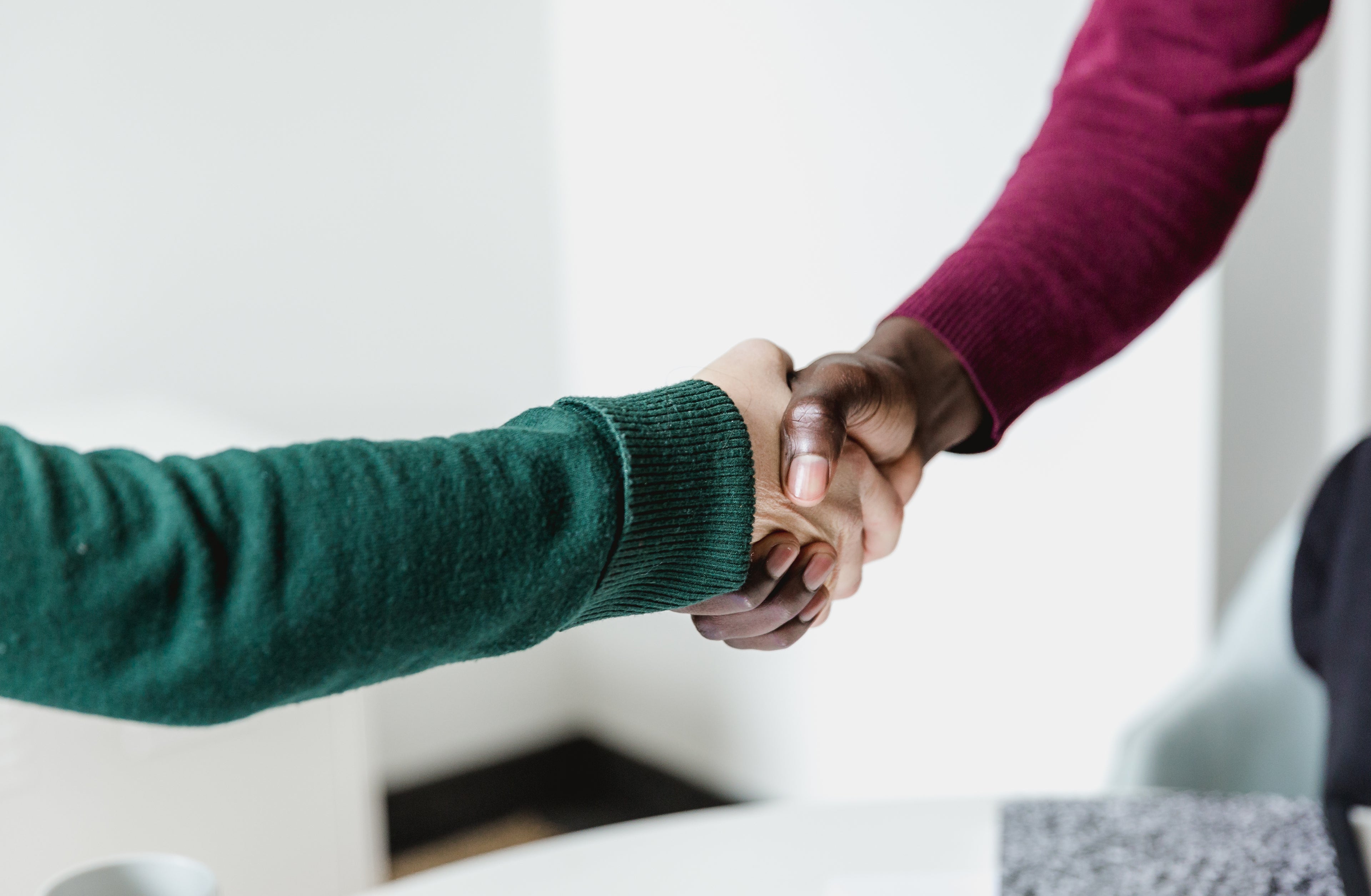 two people shaking hands